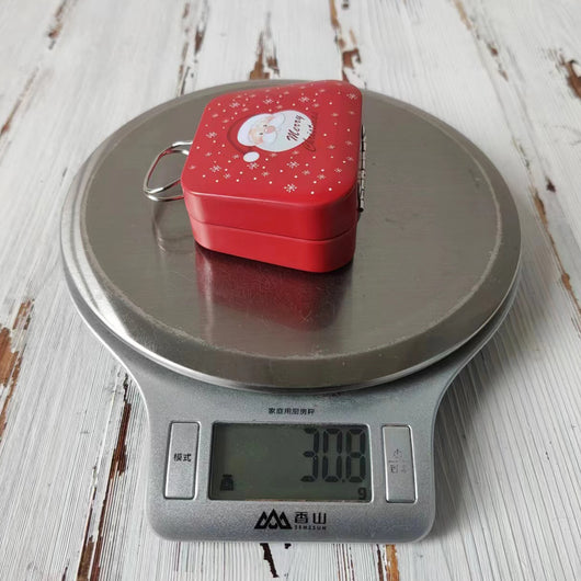 Caja de Dulces Navideña en Hojalata Estilo Bolso - Image 23