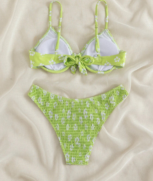 Periwinkle blue two-piece swimsuit with white floral pattern and ruched texture, featuring an underwire bikini top and high-cut bottoms. - Image 21