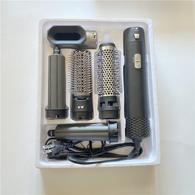 5-in-1 hot air comb hair dryer set with multiple rose red and gray attachments in a white tray. - Image 7