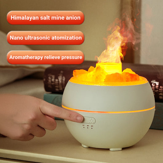 White spherical aromatherapy machine with glowing salt stones and a simulated flame effect on a white background. - Image 12