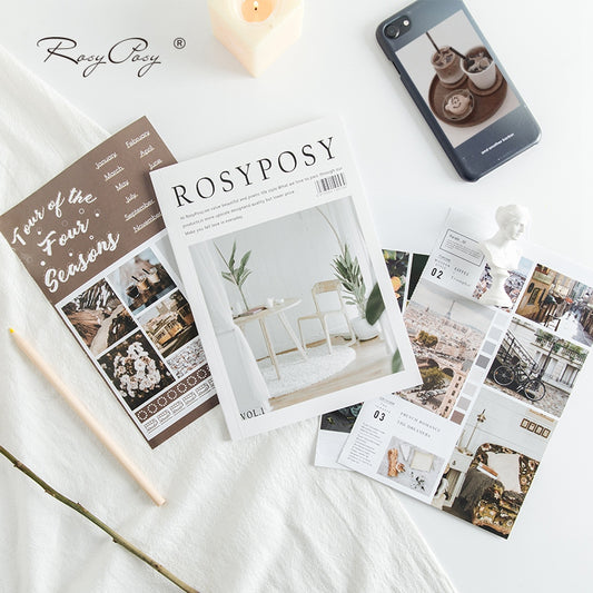 White RosyPosy magazine sticker with a minimalist interior design print featuring a table, chair, and plants.