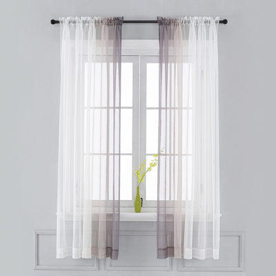 Pink and white gradient sheer rod pocket curtain panels hung on a black rod in front of a window. - Image 9