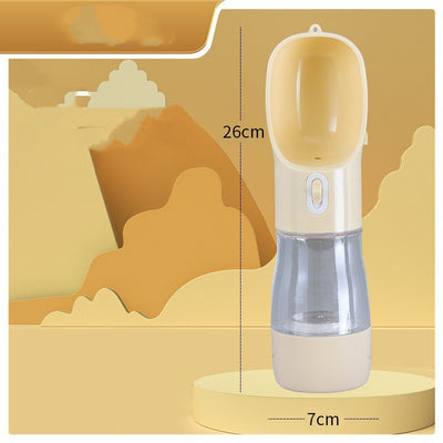 Pink portable pet water bottle with integrated feeder bowl, clear reservoir, and dispensing button for dogs. - Image 17