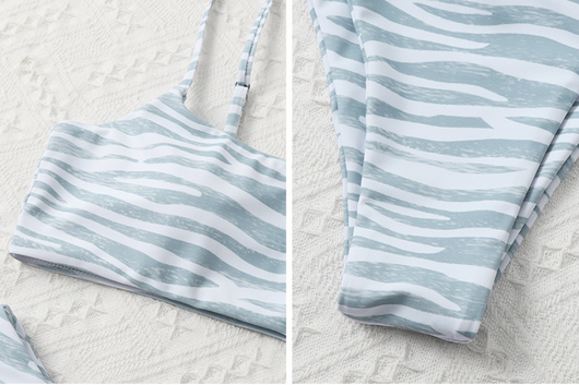 Tan and white zebra stripe two-piece bikini with a bandeau top and high-cut bottom, laid flat. - Image 26