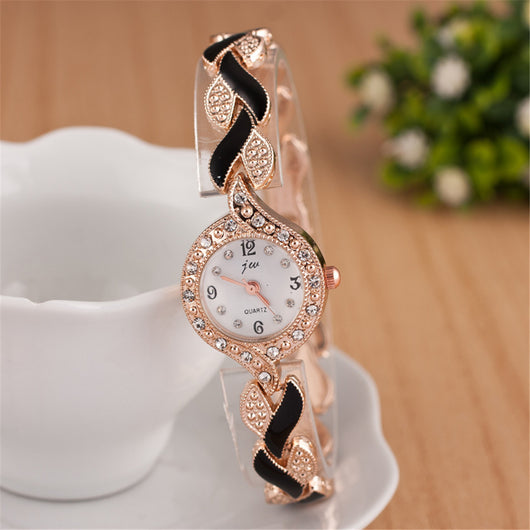 Reloj de pulsera de cuarzo con motivo de hoja