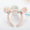 Diadema con orejas de peluche