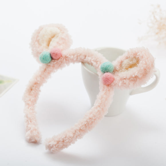 Diadema con orejas de peluche
