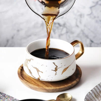 Taza de cerámica con acabado dorado - Image 4
