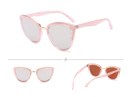 Female cat-eye sunglasses with clear marbled plastic frames, pink mirrored lenses, and gold-tone accents. - Image 8