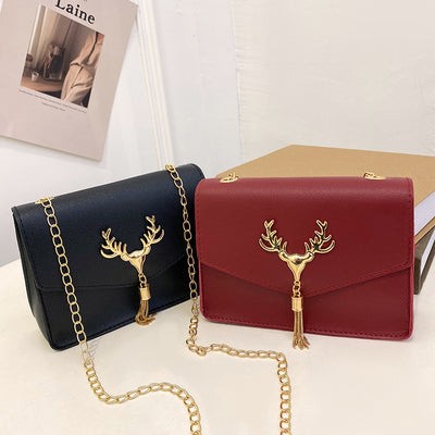 Bolso Crossbody Cuadrado Pequeño con Cadena y Detalle de Borla - Diseño Bicolor Elegante
