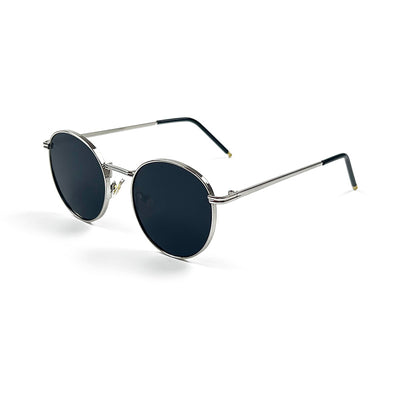 Round red lens sunglasses with a gold metal frame and black temple tips on a white background. - Image 19