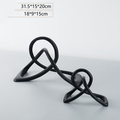 Ornamentos Geométricos Abstractos en Resina Negra con Nudo Retorcido - Image 10