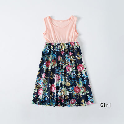 Family matching outfits including a peach and floral maxi dress, two short-sleeve shirts, a sleeveless dress, and a baby romper. - Image 20