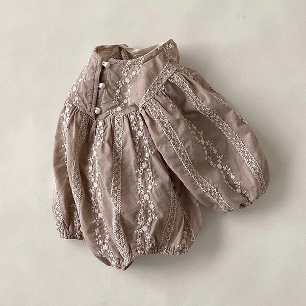 Mono Bordado Elegante para un Estilo de Vida Cosmopolita