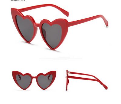 White heart-shaped sunglasses with dark gray lenses, shown from front, top, and side views on a white background. - Image 9