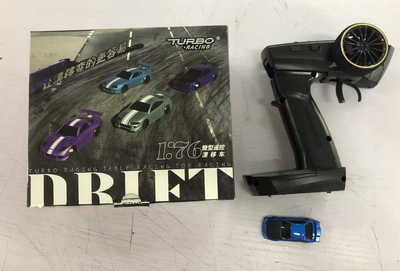 Auto de Carreras RC Turbo Racing 1vs76 C64 con Giroscopio y Control Proporcional Total - Image 10