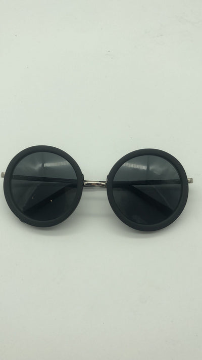 Big round sunglasses with black frames and dark lenses, featuring silver-colored temples. - Image 11