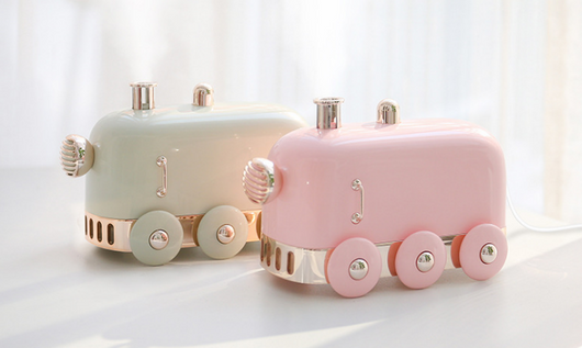 Pink retro mini train ultrasonic humidifier and aroma diffuser with rose gold accents on a white background. - Image 3