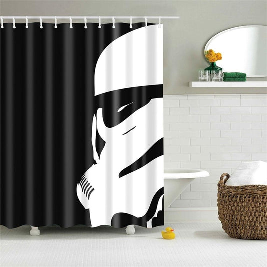 Black and white shower curtain with a stylized digital print of a Stormtrooper helmet, hanging in a modern bathroom.