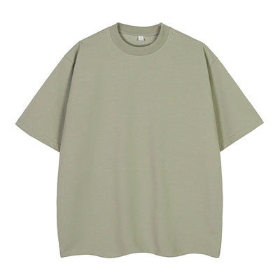 Moss green short-sleeve cotton t-shirt with a crew neck and a relaxed, oversized fit. - Image 8