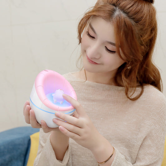 Blue and white mini humidifier with a cute white animal figure inside, suitable for car or desk. - Image 2