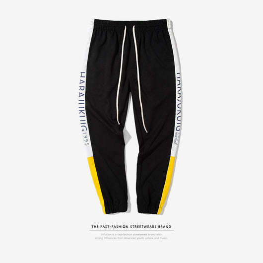 Pantalones Casuales Elásticos para Hombre con Rayas Laterales y Letras de Primavera - Image 4