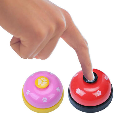 Blue and yellow pet training bell with white paw print designs and a large yellow button on top. - Image 3