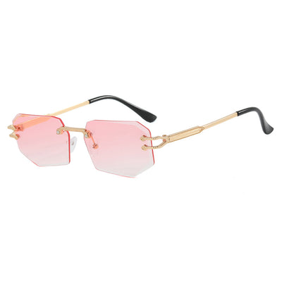 Rimless octagonal clear lens glasses with silver-toned metal temples and black ear tips, featuring decorative accents. - Image 2