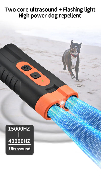 Black and orange handheld ultrasonic dog repellent with two sound emitters and two control buttons. - Image 10