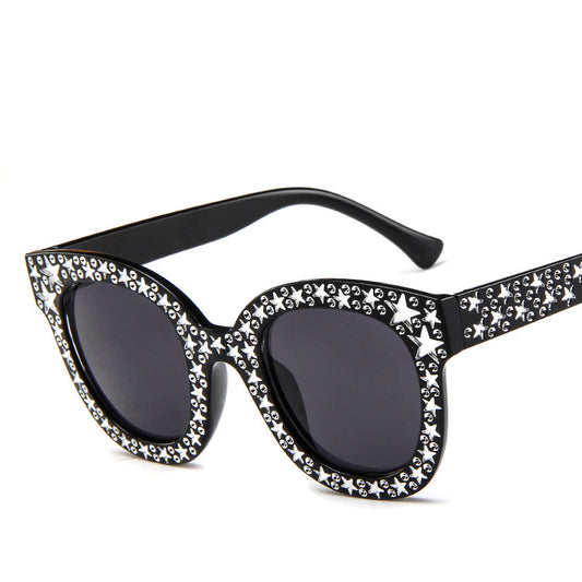 Black cat-eye sunglasses for ladies, featuring silver star embellishments on the frames and temples.
