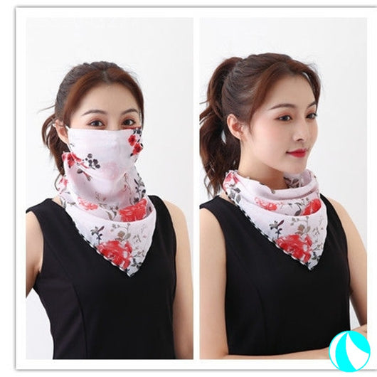 White women's UV protection scarf with black speckle pattern, worn as a face mask and neck scarf. - Image 5