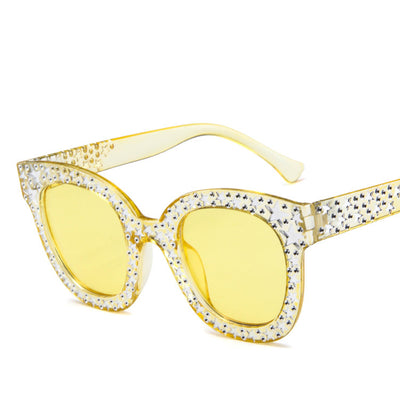 Black cat-eye sunglasses for ladies, featuring silver star embellishments on the frames and temples. - Image 13
