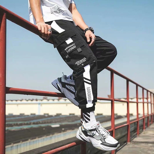 Pantalones cargo sueltos con cierres ajustables - Image 3