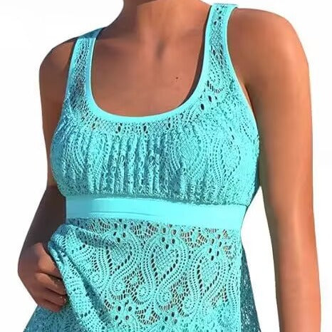 Women's turquoise two-piece swimwear set with a crochet tankini top and matching swim shorts on a beach. - Image 2