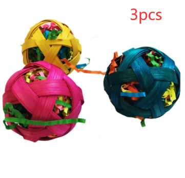 Three colorful woven bamboo toy balls, filled with shredded paper, for small pets to chew and forage. - Image 7
