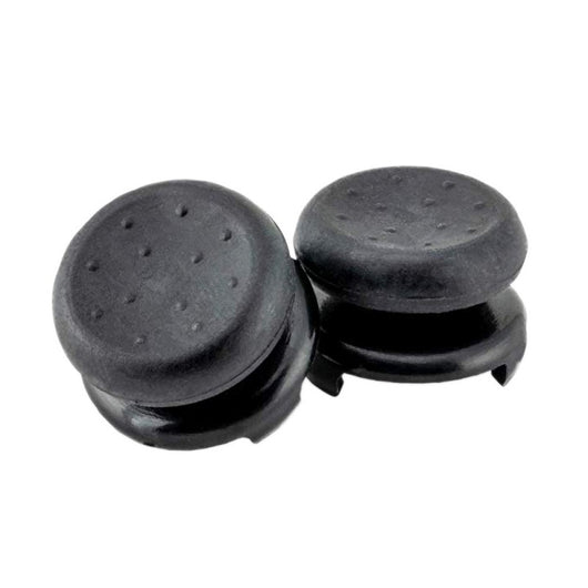 Two black ABS thumb grip extenders for PlayStation 4 controllers, featuring a textured surface for enhanced grip. - Image 7