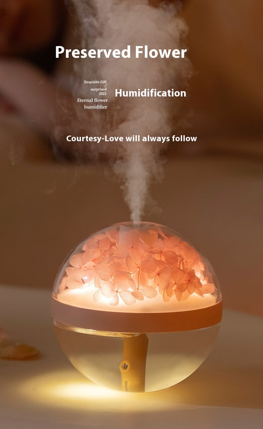 Pink round mini humidifier with clear dome, decorative pink flowers, and a light-up base, ideal for desktop or bedroom. - Image 15