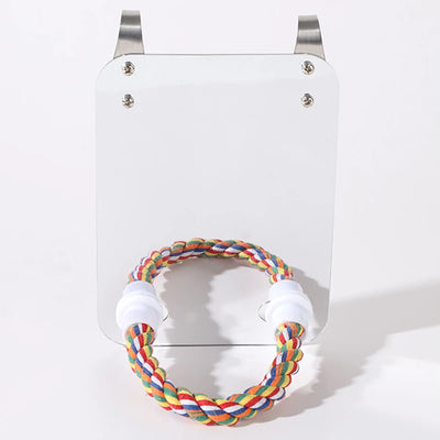 Parrot toy with a rectangular acrylic mirror and a colorful braided rope perch, designed to hang in a birdcage. - Image 13