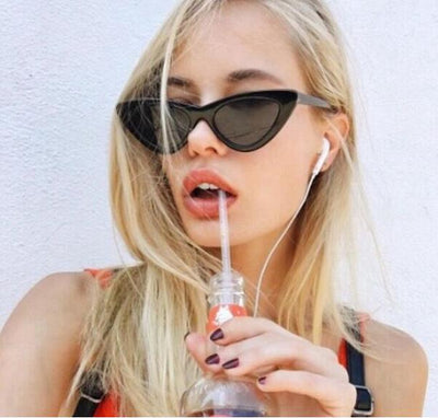 Retro cat-eye sunglasses with a tortoiseshell frame and dark lenses, ideal for a stylish, vintage look. - Image 23