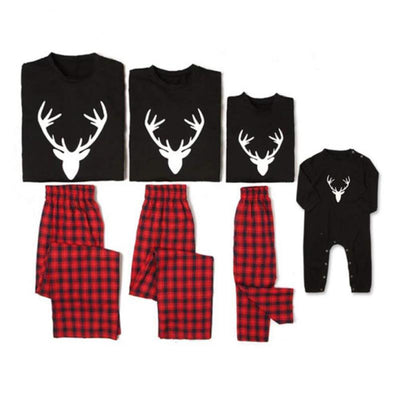 Mom's black long-sleeve pajama top with white deer head print and red and black plaid pajama pants. - Image 14