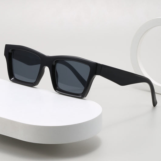Champagne translucent rectangular sunglasses with brown lenses, featuring a simple fashion design.