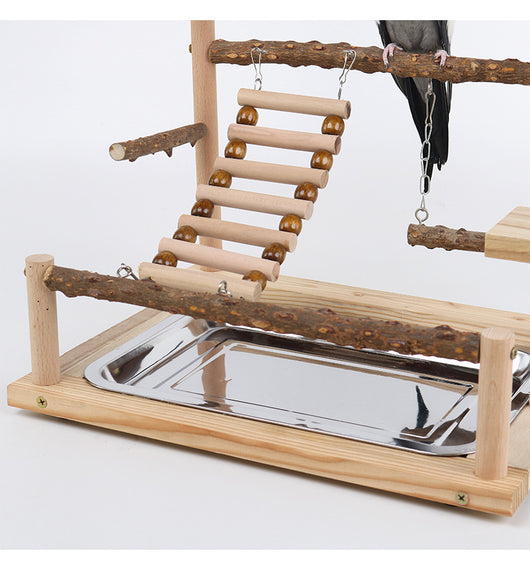 Multi-level natural wood parrot play stand with perches, ladder, swings, and two stainless steel feeding cups. - Image 11