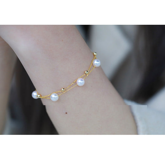 Pulsera Doble Ajustable de Perlas de Agua de Mar en Oro 18k - Image 10