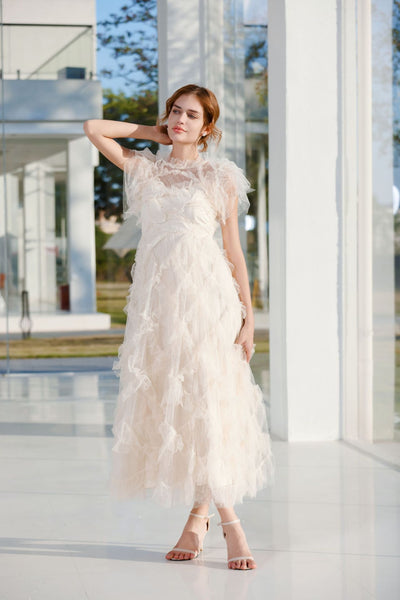 Vestido Elegante sin Mangas con Cuello Tortuga y Falda Tableada Bordada - Image 34