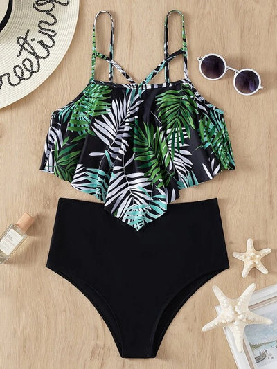 Women's split swimsuit with a black high-waisted bikini bottom and a flounced tankini top featuring a green, blue, and white tropical leaf print. - Image 24