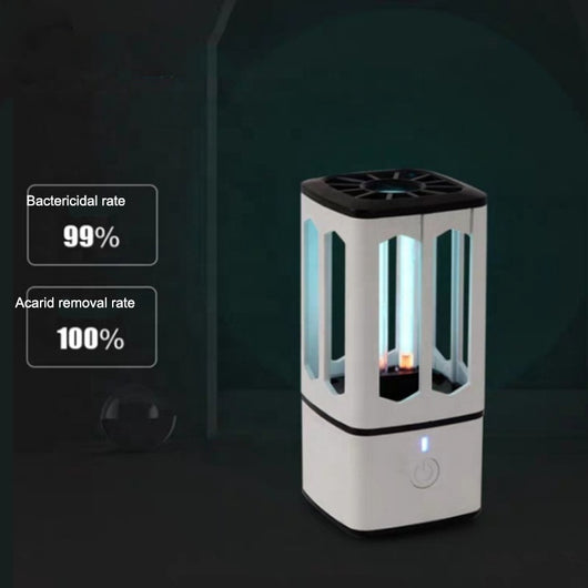 White portable UV disinfection lamp with a black top and base, featuring a visible blue UV light tube and power button. - Image 2