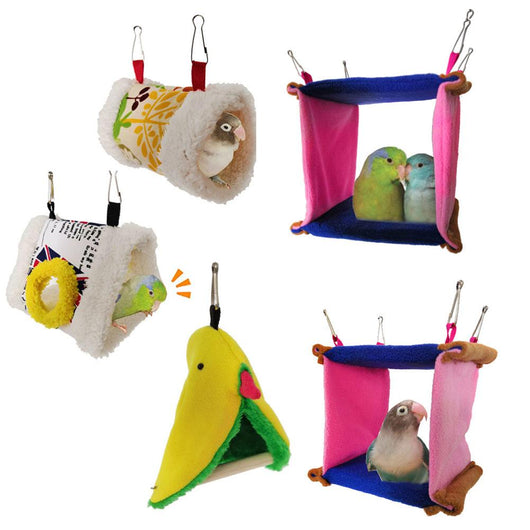Colorful blue and pink fleece bird hammock nest with a small bird peeking out, hanging by metal clips.