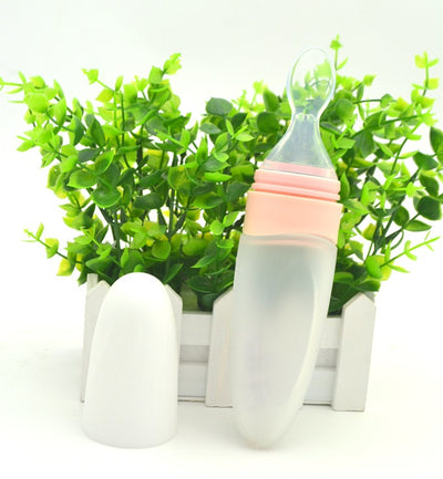 Cuchara Blanda de Silicona con Barrera para Papillas + Botella Exprimible Portátil - Image 2