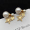 Aretes de Perla Minimalista con Estrella - Elegancia y Personalidad