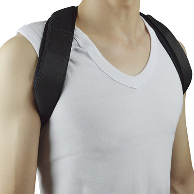 Black back shoulder spine posture corrector worn over a white long-sleeved shirt, showing adjustable straps. (2 pcs) - Image 9
